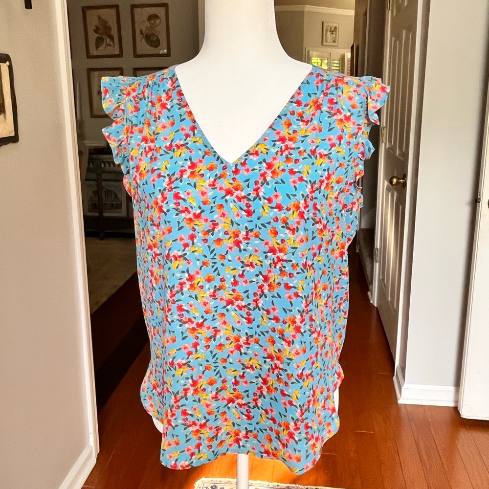 Floral top with ruffle sleeves